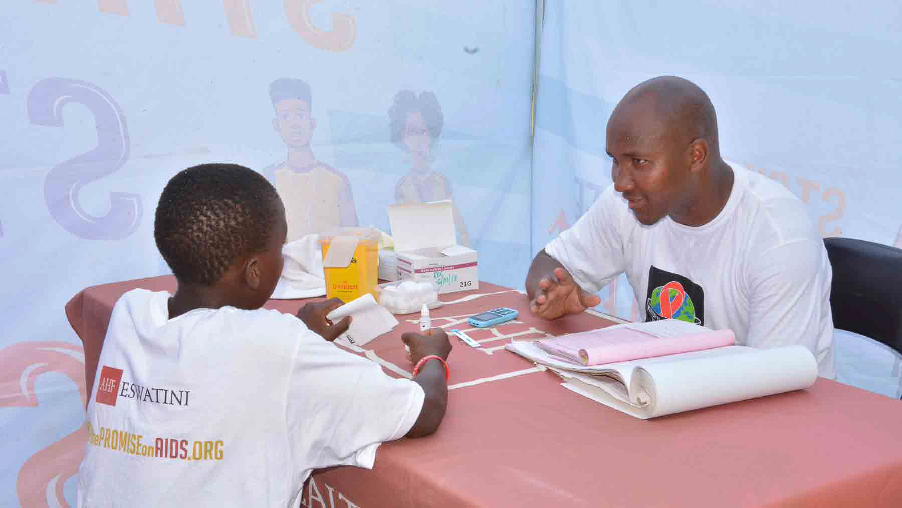 ahf eswatini free hiv testing counselor and young patient